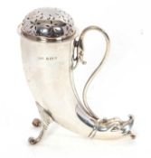 An Edwardian silver sifter in the form of a Cornucopia of scroll legs and mask terminal, 13cm