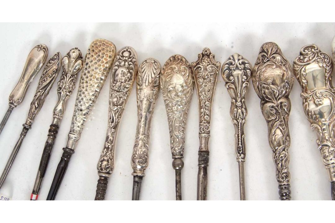A group of twenty two late 19th/early 20th Century silver and steel button hooks, various dates/ - Image 2 of 4