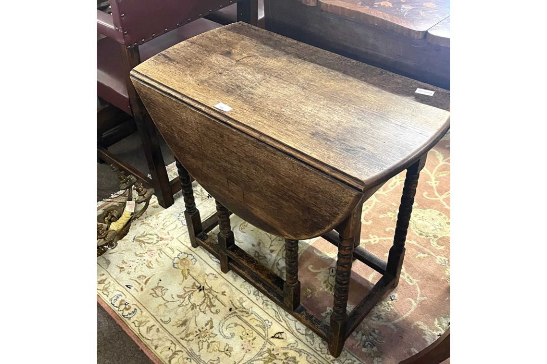 A small late 19th Century oak drop leaf table on bobbin turned legs, 73cm wide - Image 2 of 2