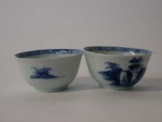 Pair of Nanking cargo tea bowls with blue and white decoration and Christie's label to base