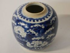 19th century Chinese porcelain jar with four character mark to base, the blue ground with prunus