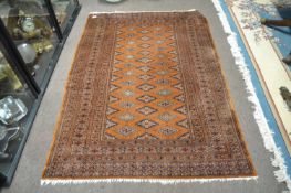 A Persian rug 180cm x 125cm