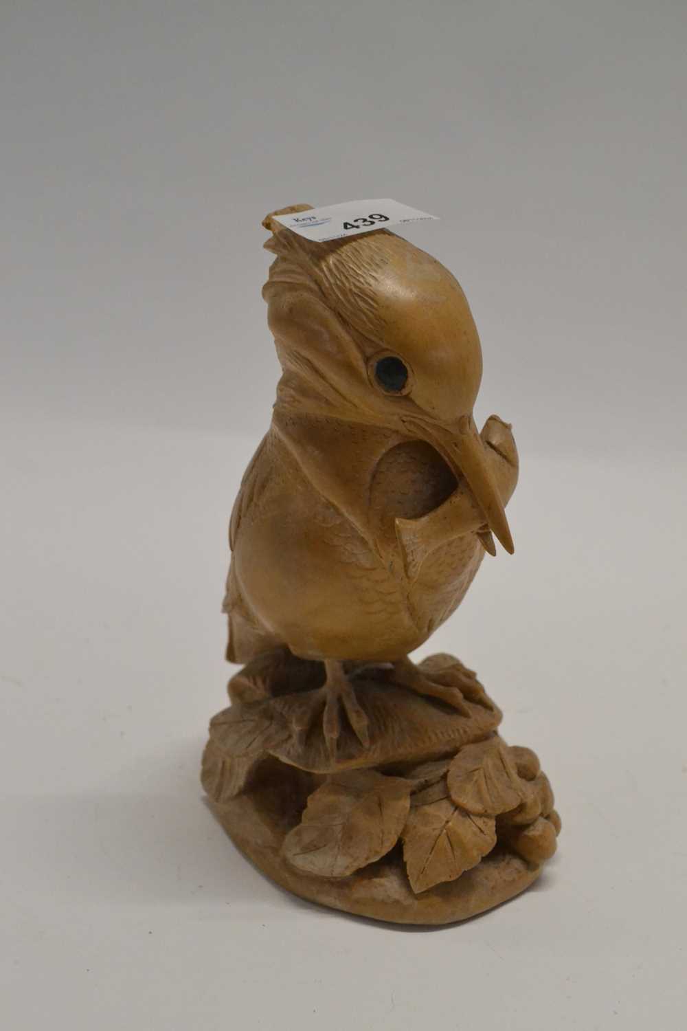A carved wooden model of a Kingfisher, the base signed J H Williams, 18cm high