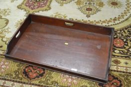 A Victorian mahogany butlers tray of typical form, 76cm wide