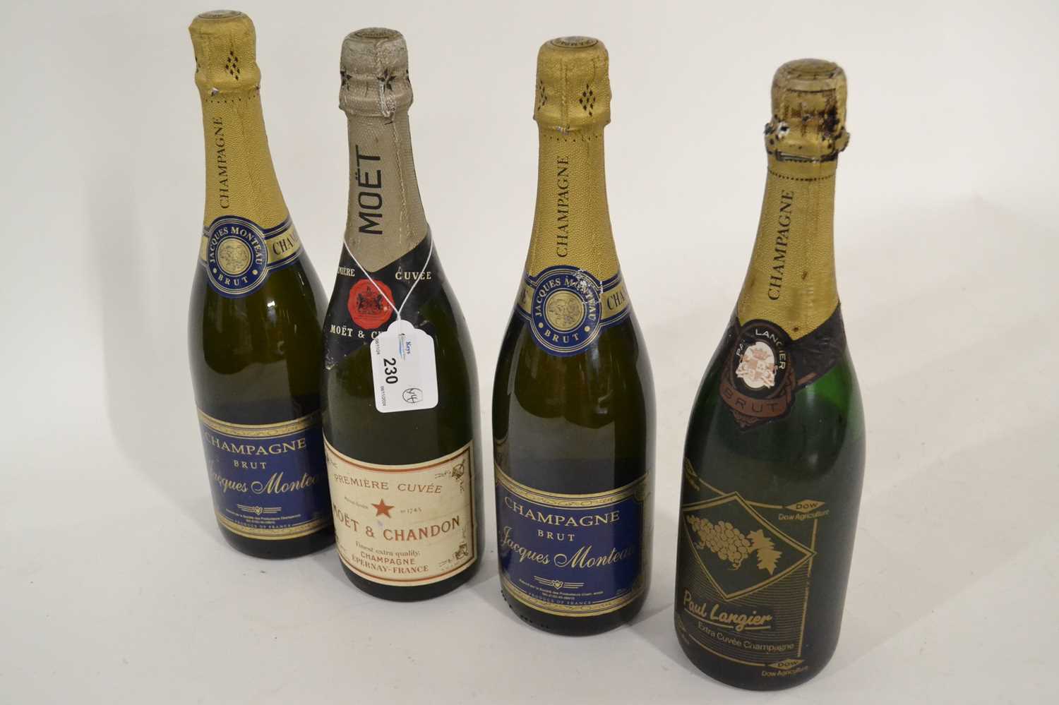 Four bottles of assorted champagnes, to include Moet & Chandon, Jaques Monteau and Pauyl Langier, (