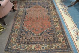 Antique Middle Eastern wool floor rug with large central red panel, 138 x 223cm