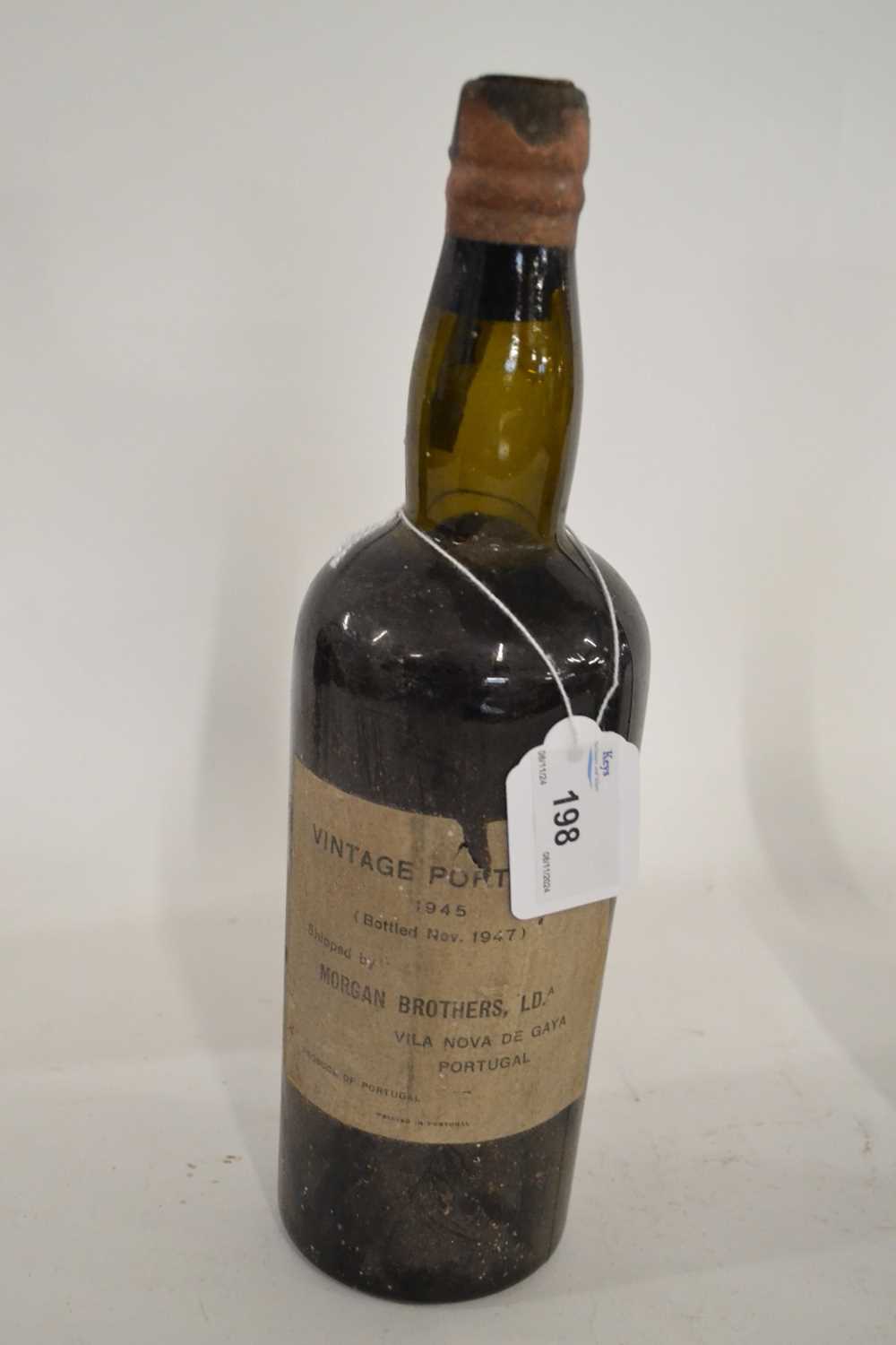 One bottle of Morgan Brothers Vintage Port Wine 1945 (bottled Nov. 1947)