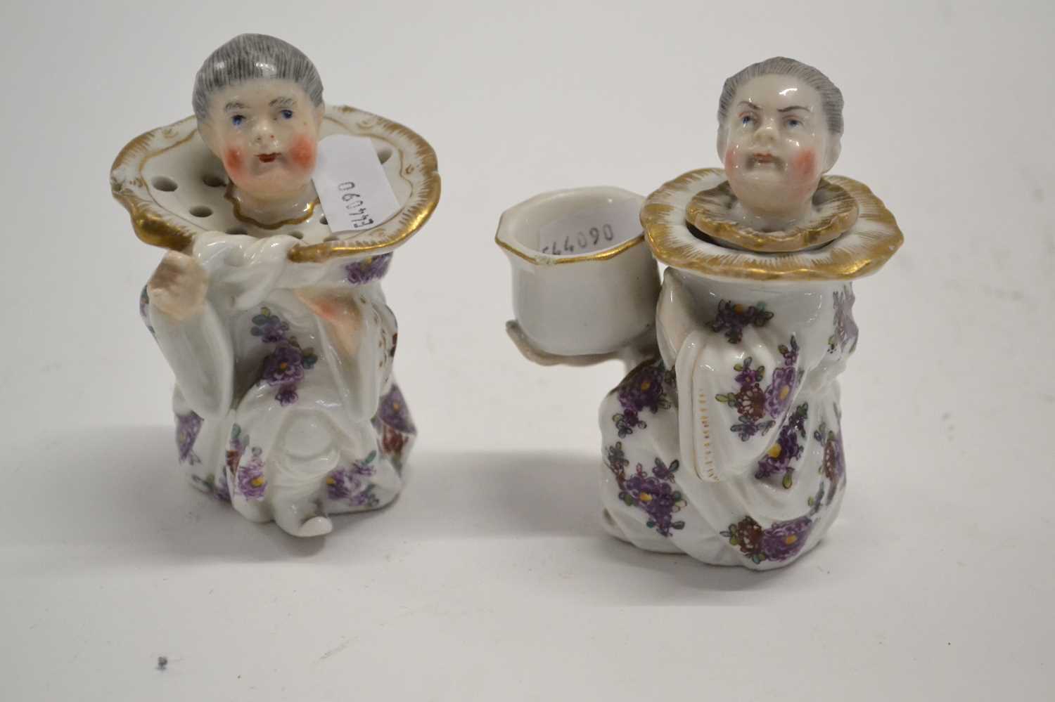 A pair of late 19th Century nodding figures modelled as ink wells or cruet
