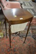 A late 19th Century mahogany sewing table with hinged lid, fitted interior and a fabric lined