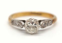 An 18ct and platinum diamond solitaire ring, the round brilliant cut diamond, estimated approx. 0.