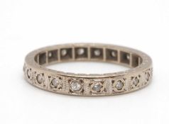 A diamond eternity ring, set throughout with single cut diamonds, total estimated approx. 0.20cts,