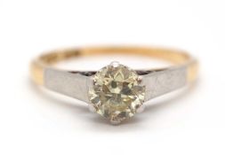 An 18ct and platinum diamond solitaire ring, the round brilliant cut diamond, estimated approx. 0.