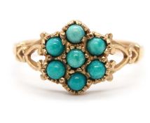 A 9ct turquoise flowerhead cluster ring, set with round turquoise cabochons, with loveheart shape