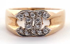 A 9ct ring, set with two interlocking C's set with white stones, tapered shoulders and plain band