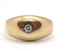 A 9ct diamond ring, the gypsy set round brilliant cut diamond with tapered shoulders and band