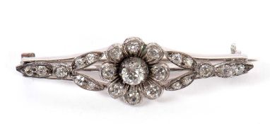 A early 20th century diamond brooch, set throughout with old mine cut diamonds, total estimated