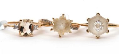 Three gemset rings: to include a 9ct citrine and white stone ring with plain band hallmarked