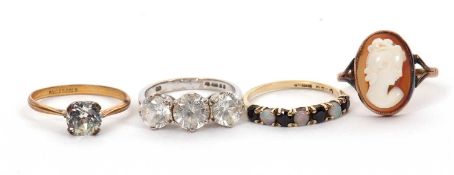 Four gemset rings: to include a 9ct opal and sapphire ring, hallmarked Birmingham 1985, size L, 1.