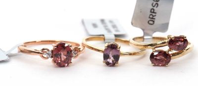 Three gemset rings: to include a 9ct purple spinel single stone ring with plain band hallmarked
