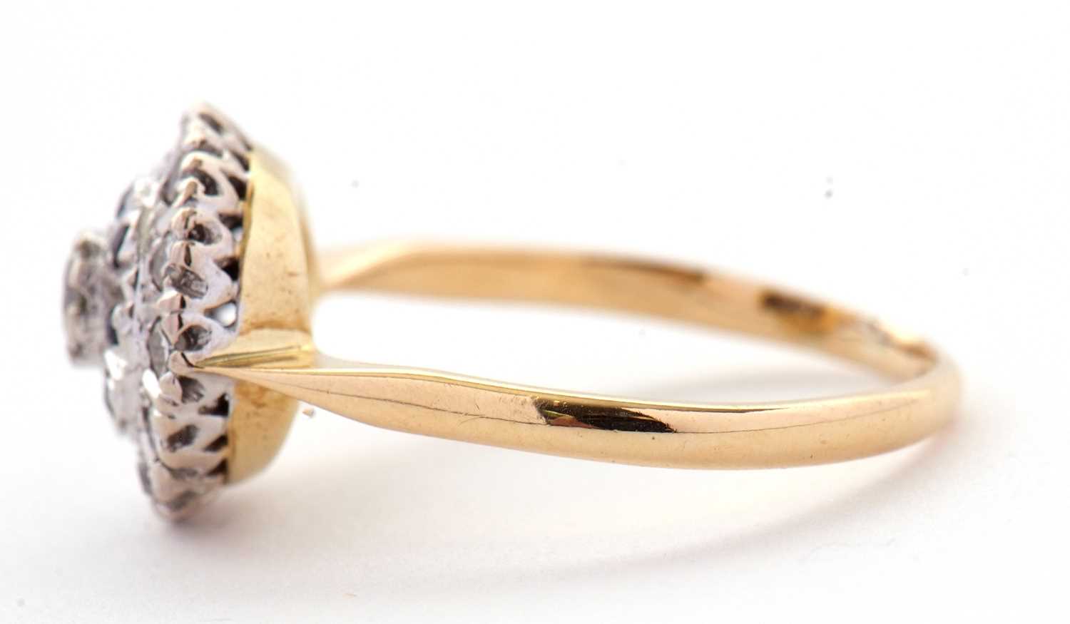 A sapphire and diamond cluster ring, the central round brilliant cut diamond surrounded by a ring of - Image 7 of 7