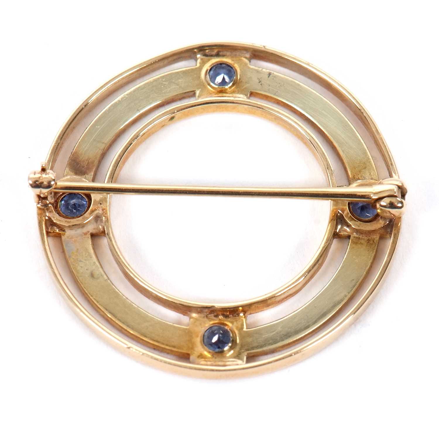 A late 19th/early 20th century sapphire brooch, the ring set with four pale blue sapphires, all - Image 4 of 4