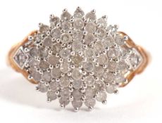 A 9ct diamond cluster ring, the tiered cluster comprised of small round brilliant cut diamonds,