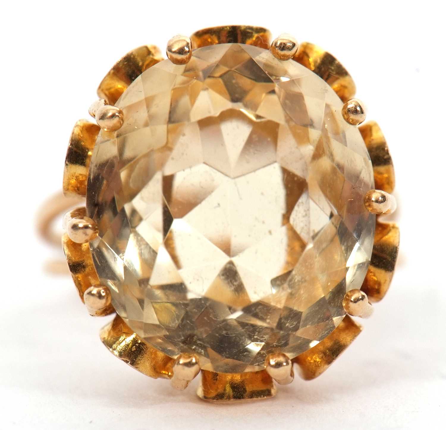 A citrine ring, the oval mixed cut citrine, approx. 16mm long, claw mounted with looped gallery, - Image 4 of 7