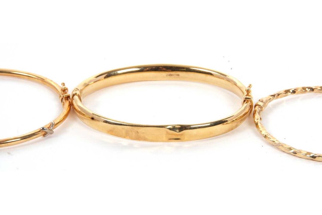Two 9ct bangles and another: to include a 9ct hinged bangle stamped 375 with Sheffield assay mark, - Image 2 of 4