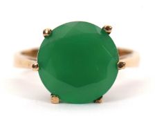 A prasiolite ring, the round green prasiolite, approx. 12mm diameter, claw mounted to a plain band