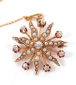 An early 20th century seed pearl and diamond star brooch, set to centre with an old European cut