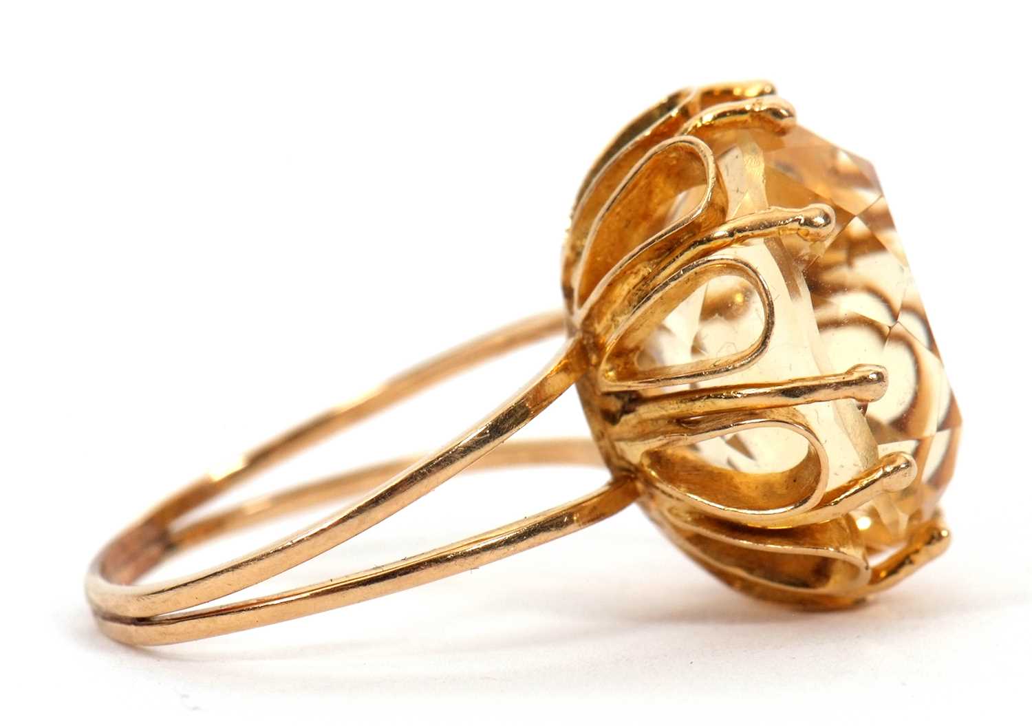 A citrine ring, the oval mixed cut citrine, approx. 16mm long, claw mounted with looped gallery, - Image 7 of 7