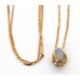 A 9ct opal and diamond pendant necklace, the oval opal cabochon in a pear shape mount with diamond - Image 4 of 4