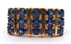 A 9ct stone blue gemset ring, the three rows of round faceted gemstones (possibly kyanite), with