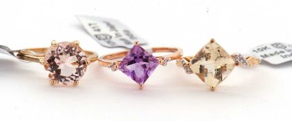 Three 9ct gemset rings: to include a 9ct single stone hexagonal morganite, with plain band