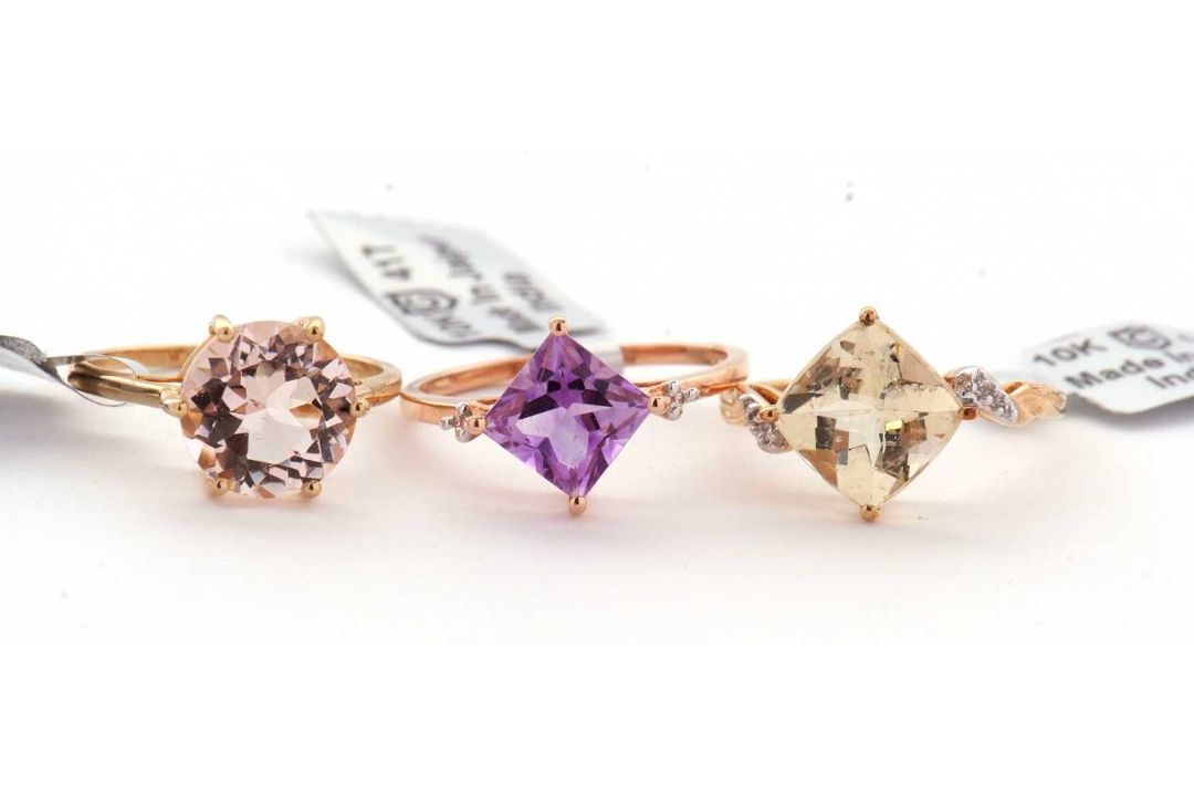 Three 9ct gemset rings: to include a 9ct single stone hexagonal morganite, with plain band - Image 1 of 3