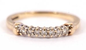A 14ct diamond ring, set with small round diamonds with plain band indistinctly stamped 585, size L,