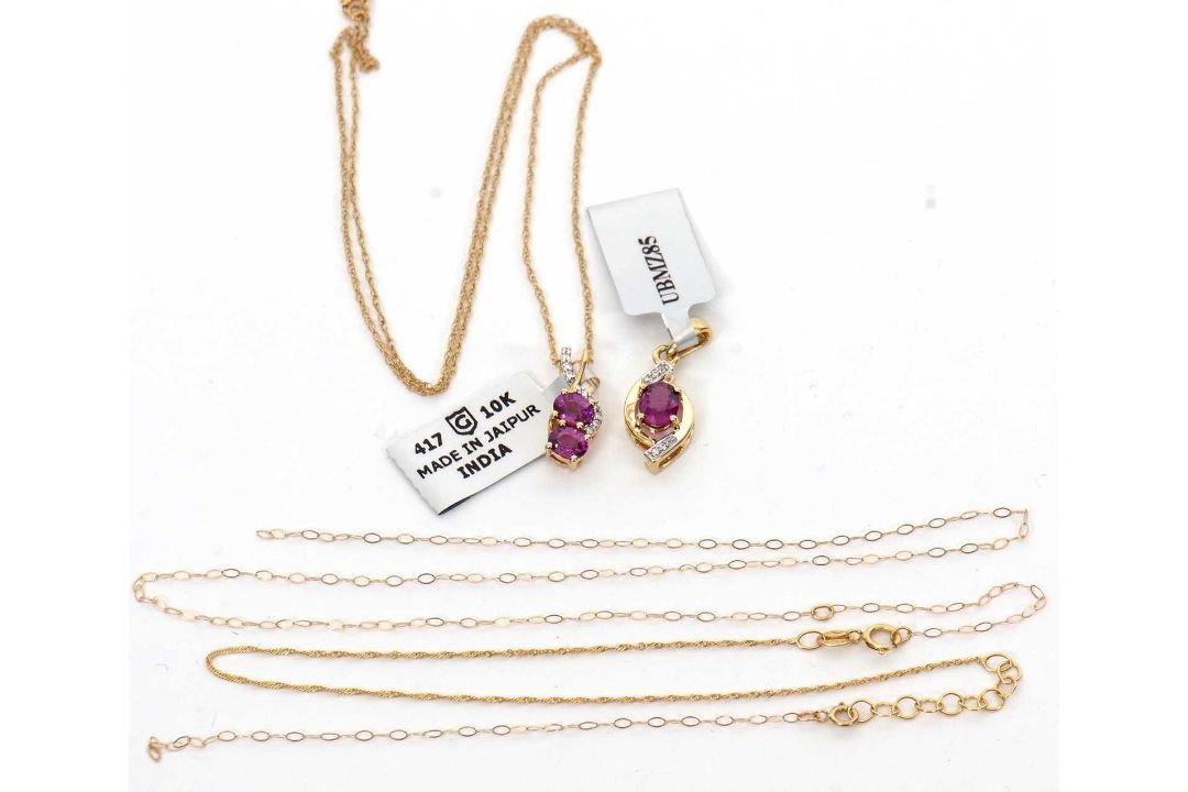 Two 10k rubelite necklaces: to include a two stone rubelite and white stone pendant stmaped 10K, - Image 2 of 2