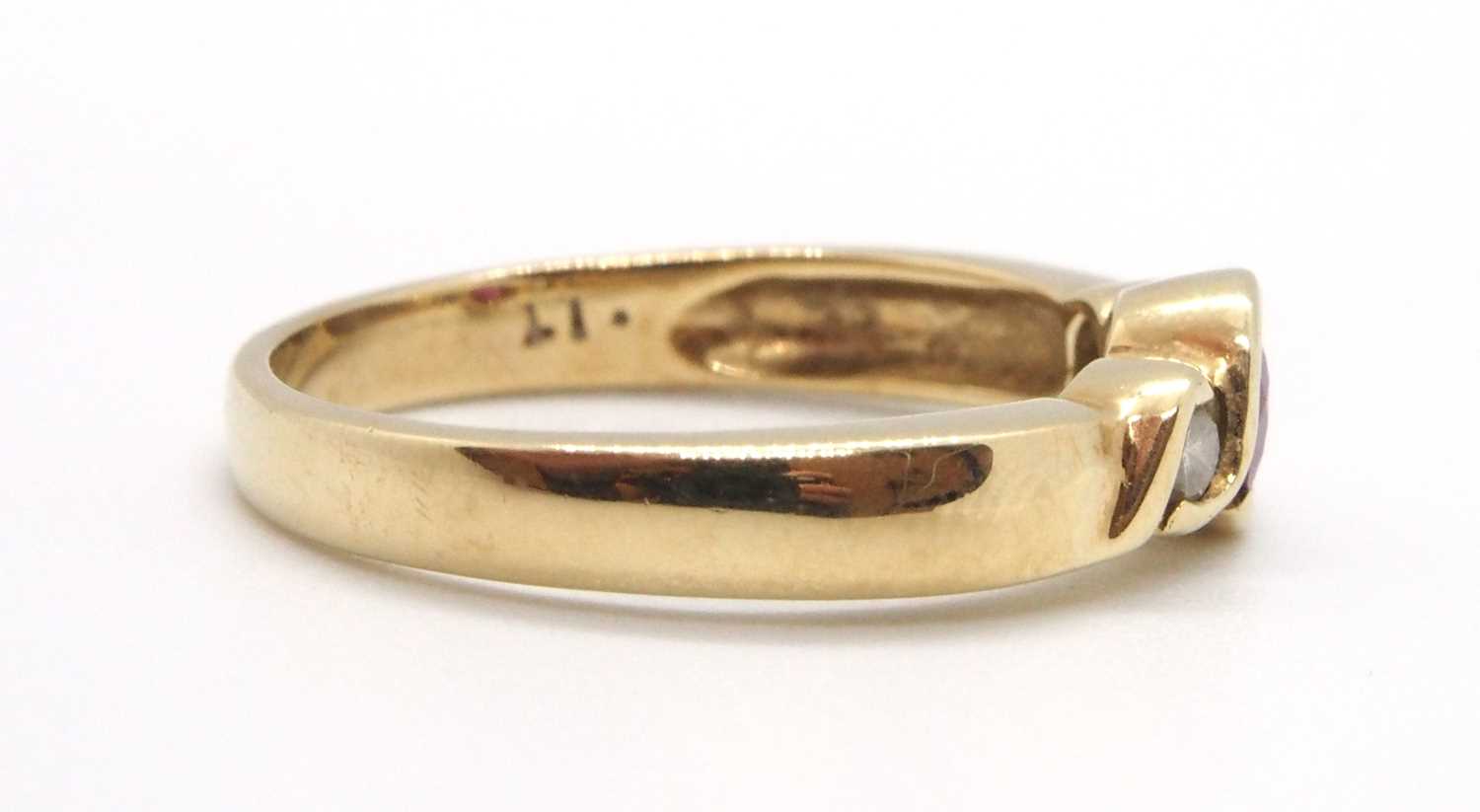 A 9ct ruby and diamond ring, the round collet mounted ruby with a round brilliant cut diamond to - Image 7 of 8