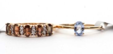 Two gemset rings: to include a 9ct andalusite and white stone ring, with plain band hallmarked