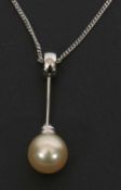 An 18ct white gold, diamond and cultured pearl pendant and 9ct white gold chain, the pendant set