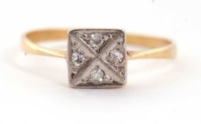 An Edwardian diamond ring, the square plaque set with four single cut diamonds, with plain