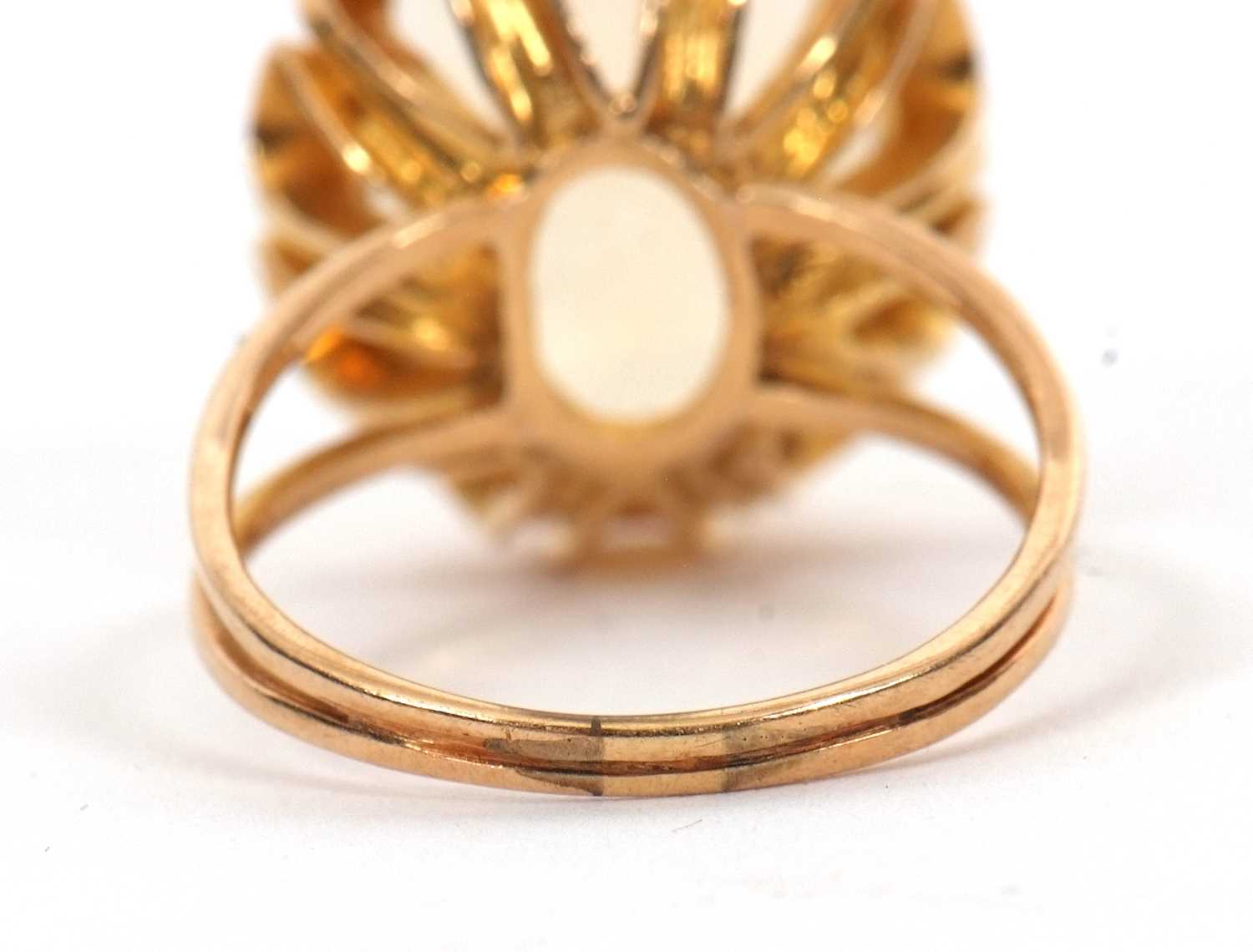 A citrine ring, the oval mixed cut citrine, approx. 16mm long, claw mounted with looped gallery, - Image 2 of 7