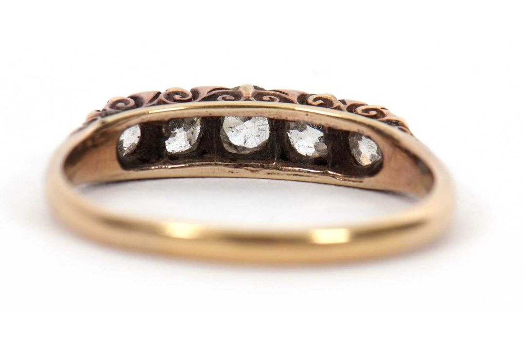 A five stone diamond ring, the five graudated old mine cut diamonds, total estimated approx. 1. - Image 3 of 6