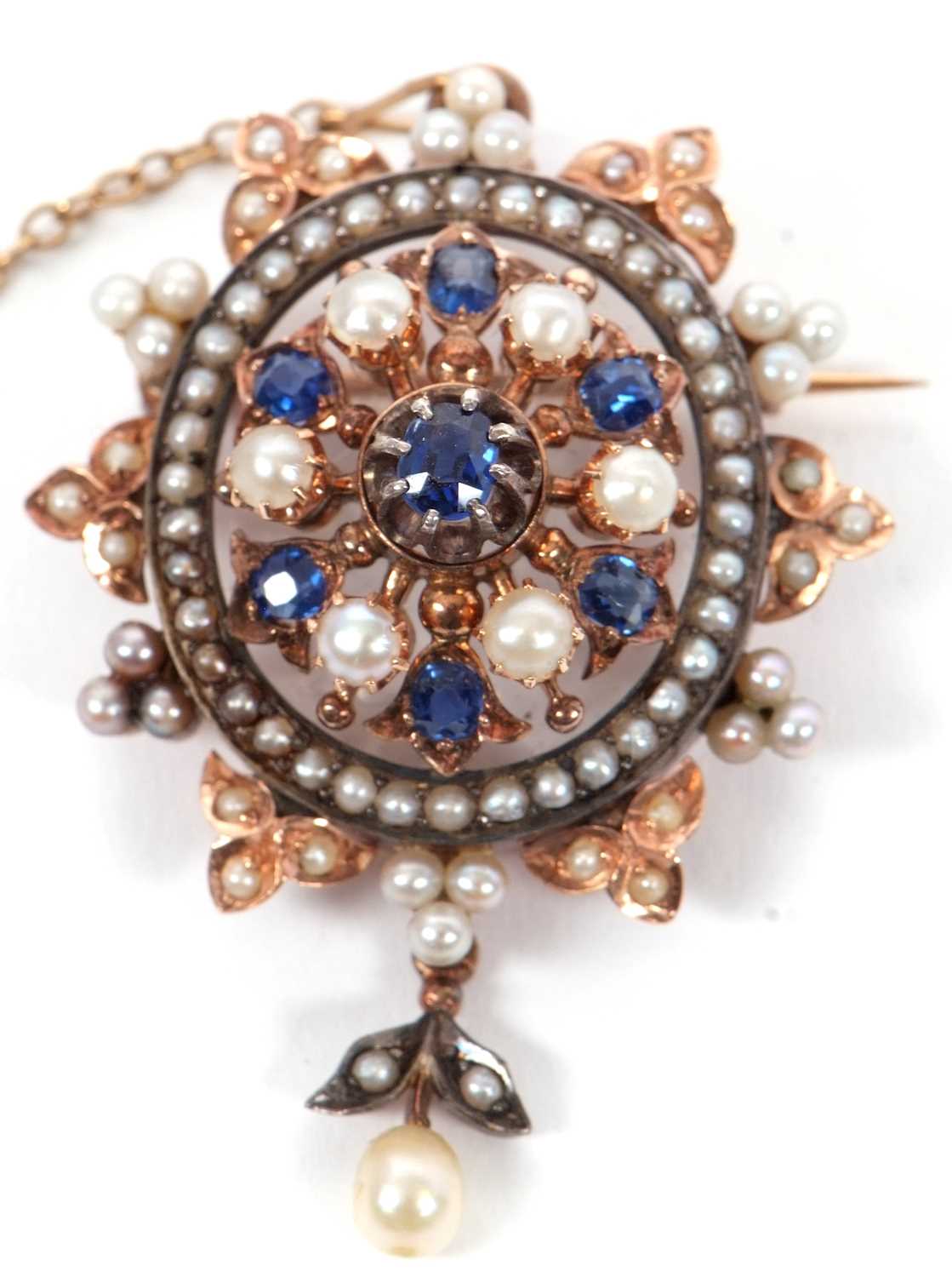 A late 19th century sapphire and pearl brooch, the ciruclar brooch set to centre with an oval - Image 3 of 3
