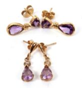 Two pairs of amethyst earrings: to include a pair of 9ct two stone amethyst drop earrings, with