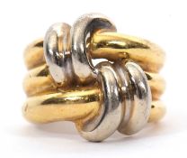 An unmarked two tone ring, the two strand crossover knot style ring, all in unmarked yellow
