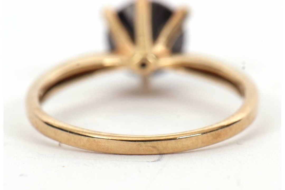 A 9ct black diamond ring, the round brilliant cut diamond, estimated approx. 2.0cts, in a six claw - Image 4 of 5