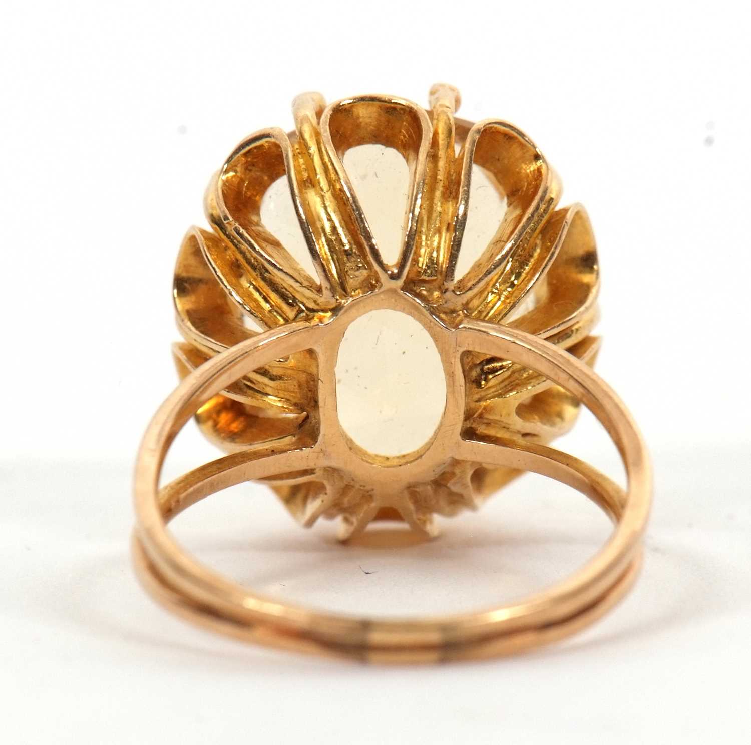 A citrine ring, the oval mixed cut citrine, approx. 16mm long, claw mounted with looped gallery, - Image 3 of 7