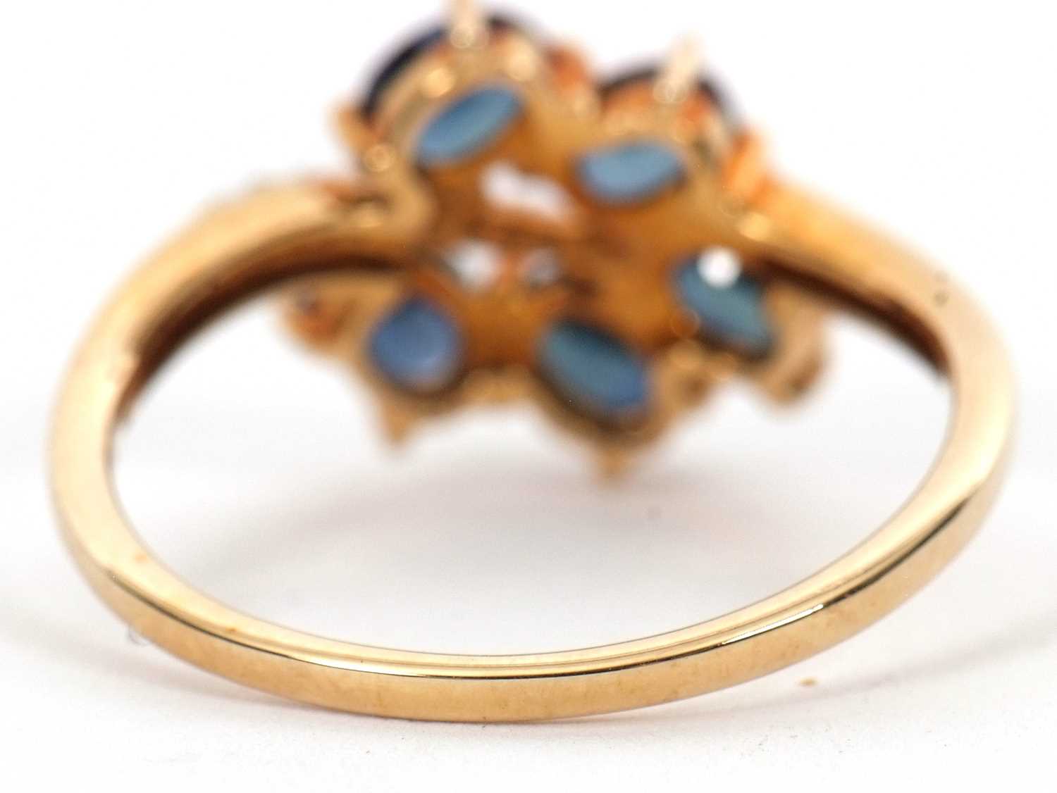 A 9ct blue stone and diamond ring, the leaf shape ring set with five oval blue stones (probably - Image 3 of 6