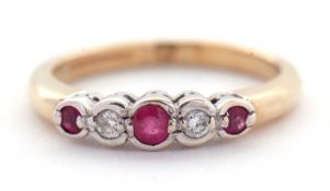 A 9ct ruby and diamond ring, the alternating graduated round rubies and diamonds, collet mounted